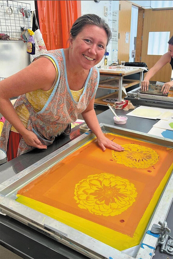 New full-time artist Jenny Green works on her printmaking technique in a class at Frogman's Print Workshops at the University of Nebraska Omaha.